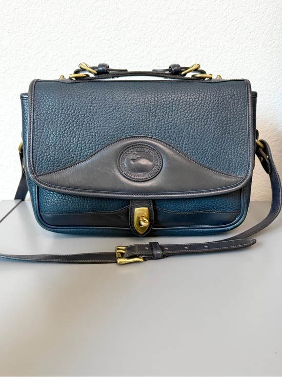 Dooney & Bourke Handbags - Dooney & Bourke Blue Leather Crossbody Bag with brass Hardware Vintage